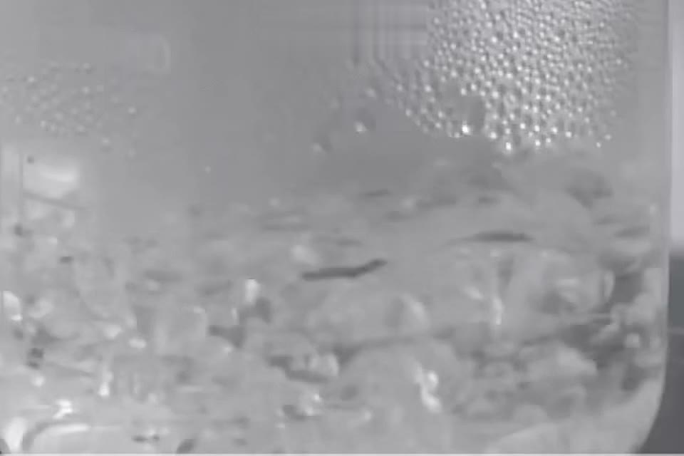Purified carbon crystals in a laboratory vessel